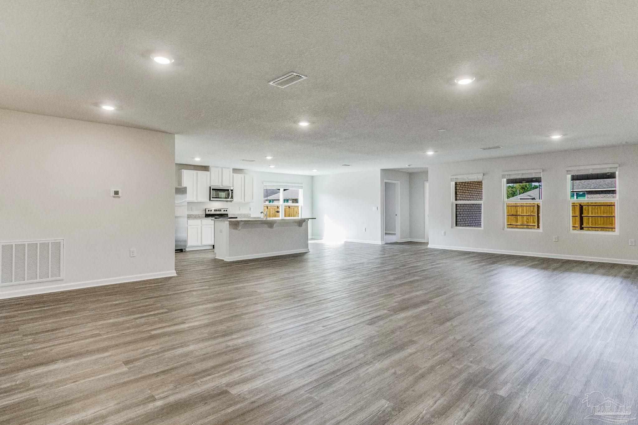 9823 MilleeLoop Loop Pensacola, FL 32526 - Photo 4 of 50 a view of a kitchen with a sink and a stove top oven