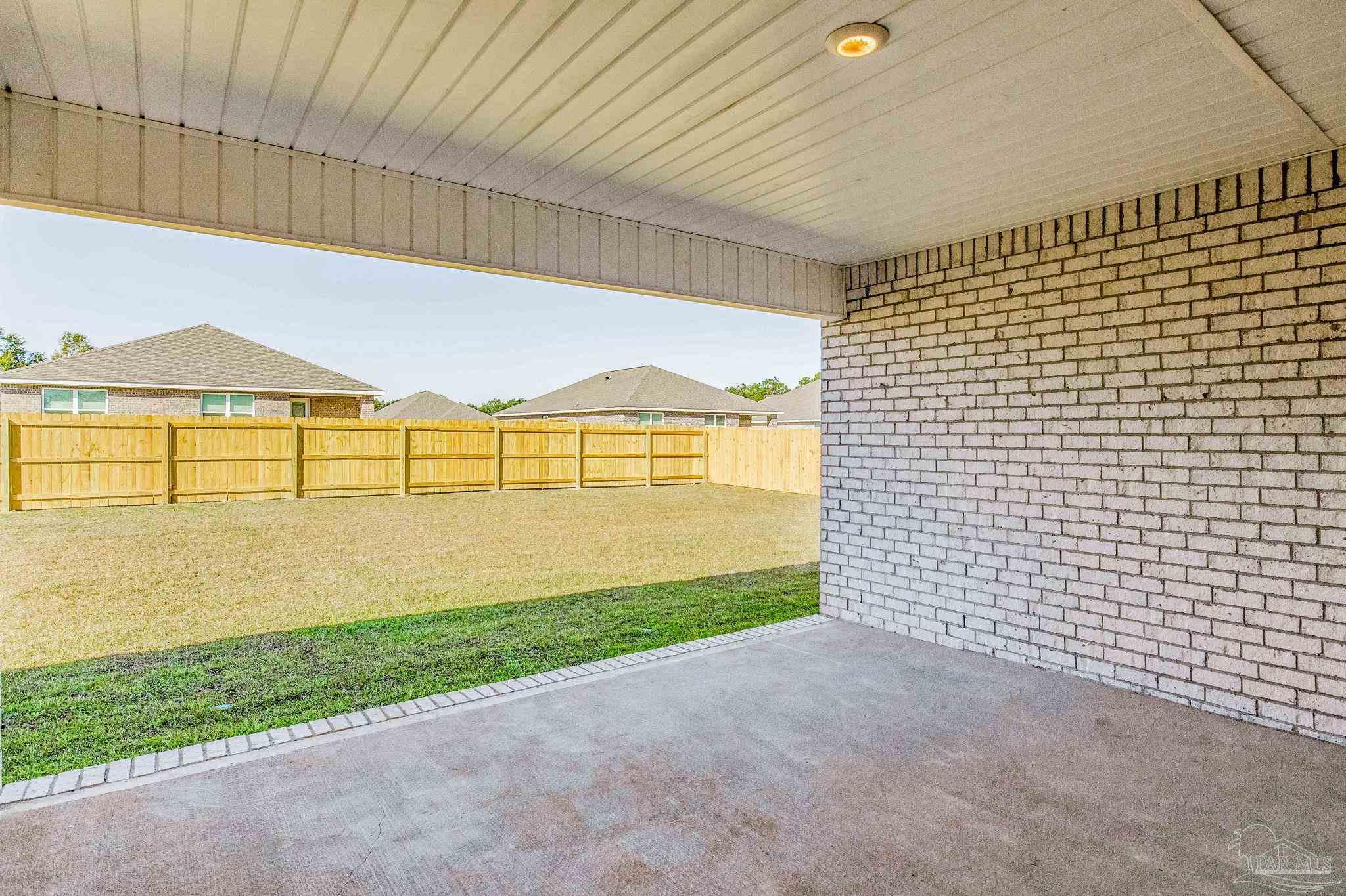 9823 MilleeLoop Loop Pensacola, FL 32526 - Photo 44 of 50 a view of an empty room with a window