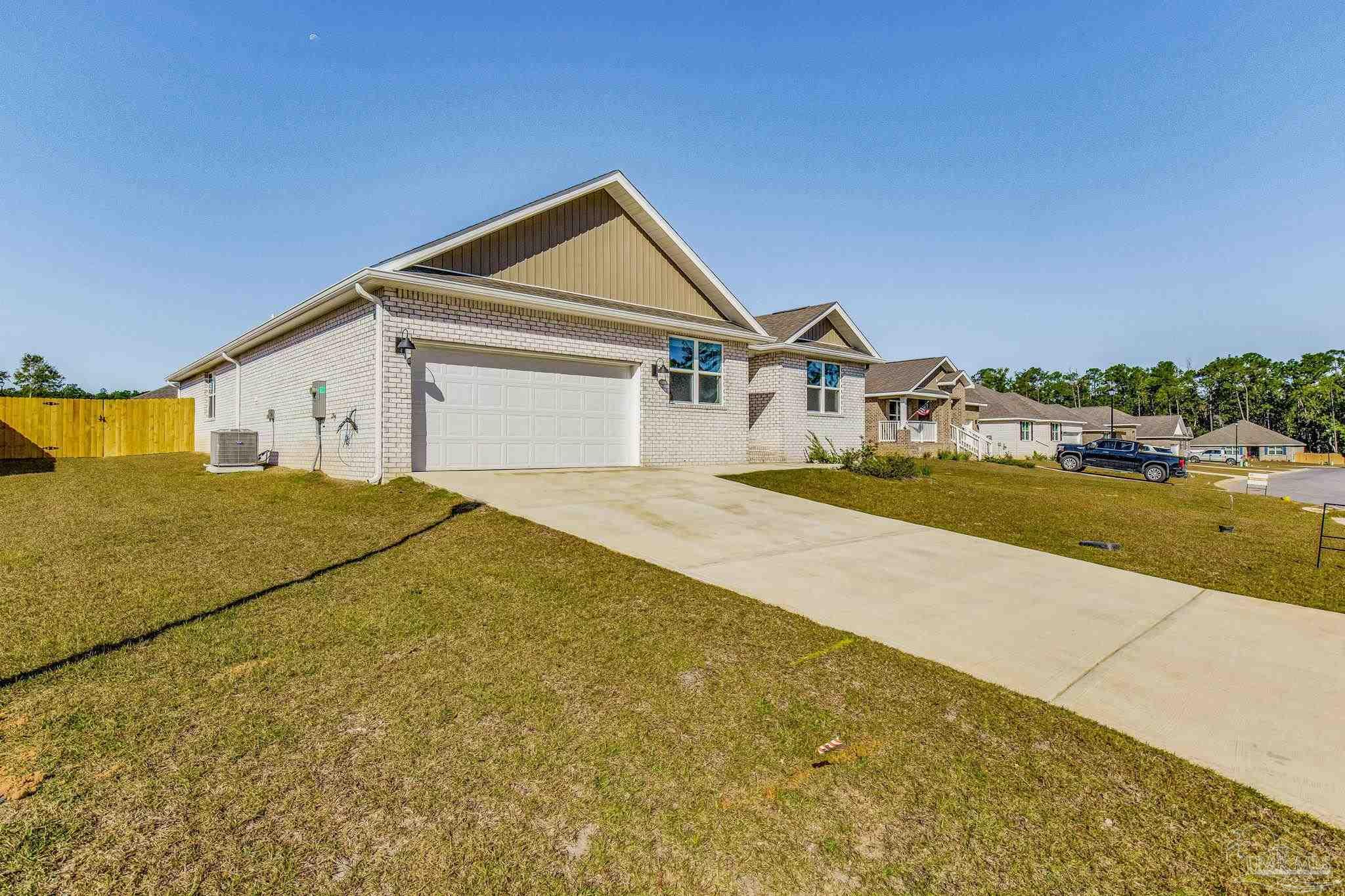 9823 MilleeLoop Loop Pensacola, FL 32526 - Photo 45 of 50 a house view with a outdoor space