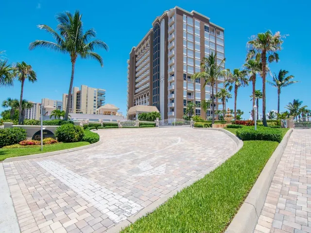 a view of an swimming pool with an outdoor seating