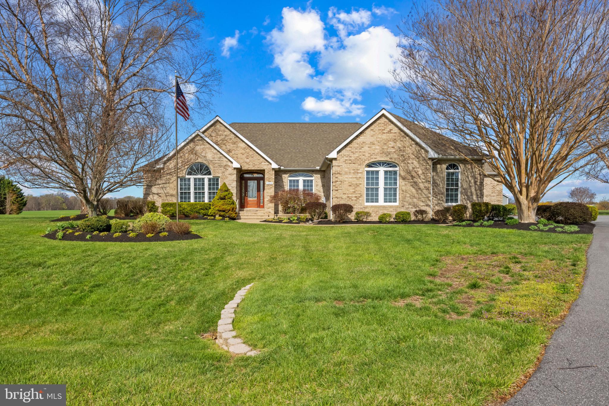 209 Beck Farm Road Centreville, MD 21617 - Photo 1 of 55 a front view of house with yard and green space