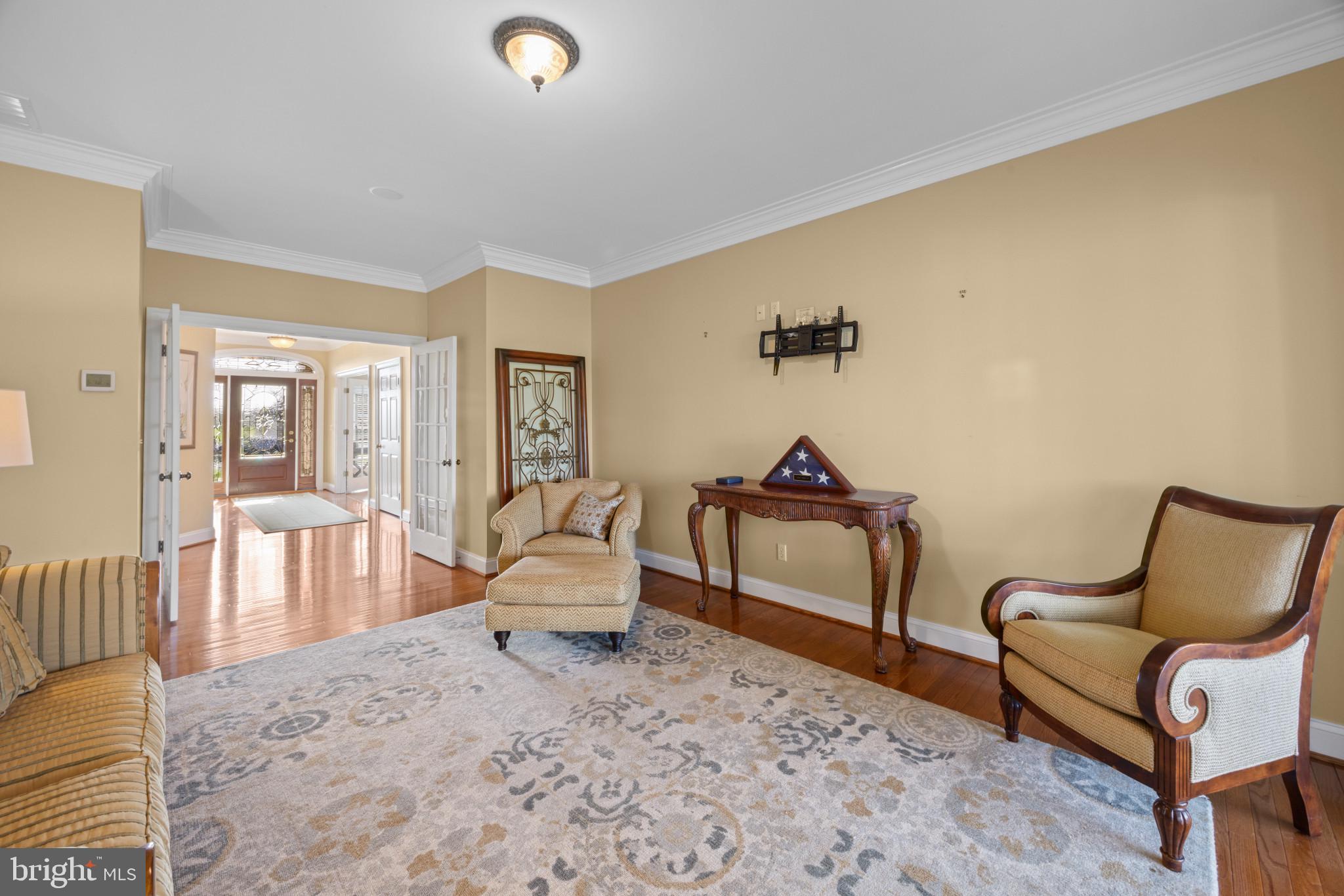209 Beck Farm Road Centreville, MD 21617 - Photo 11 of 55 a bedroom with furniture and wooden floor