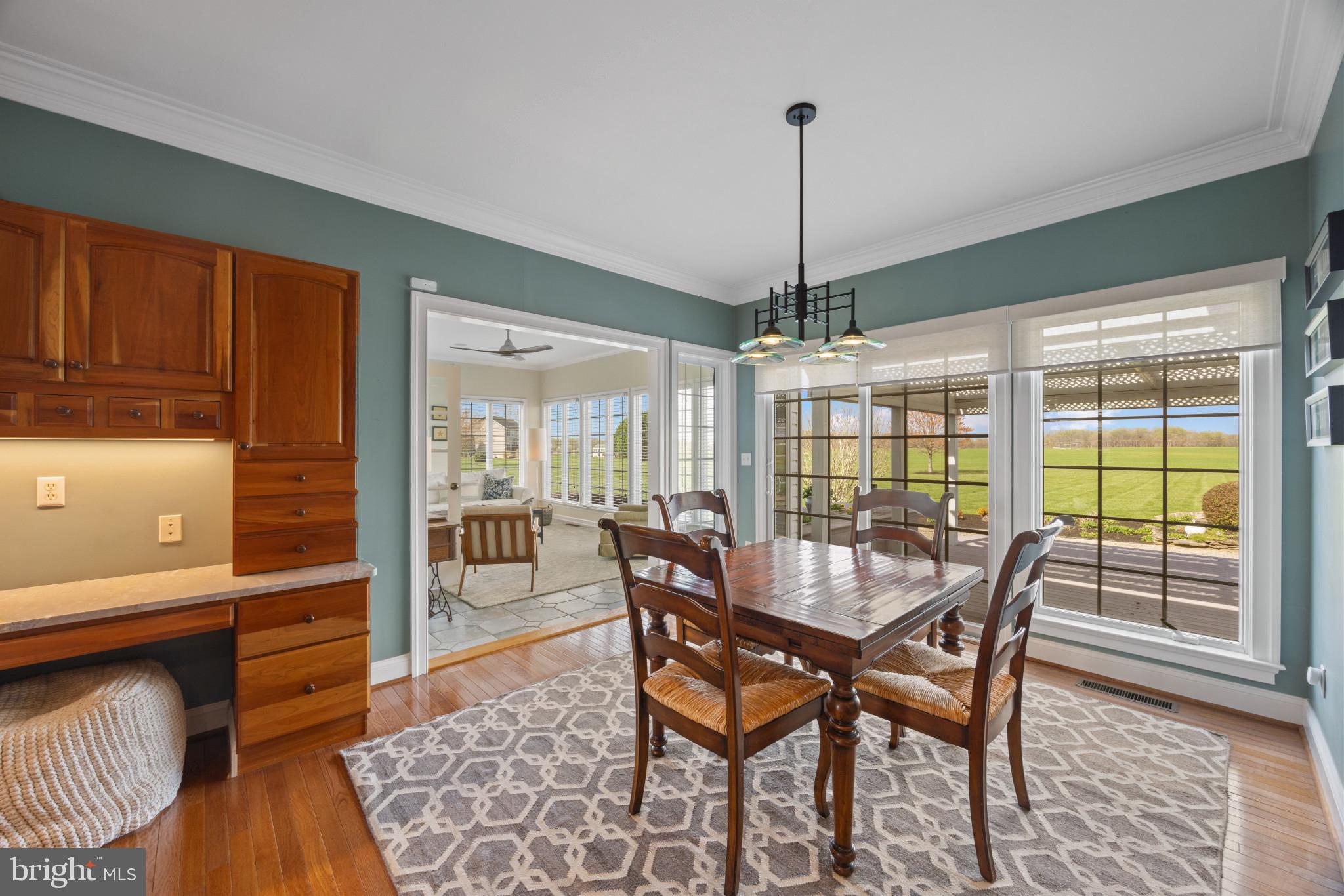 209 Beck Farm Road Centreville, MD 21617 - Photo 15 of 55 a dining room with furniture window wooden floor