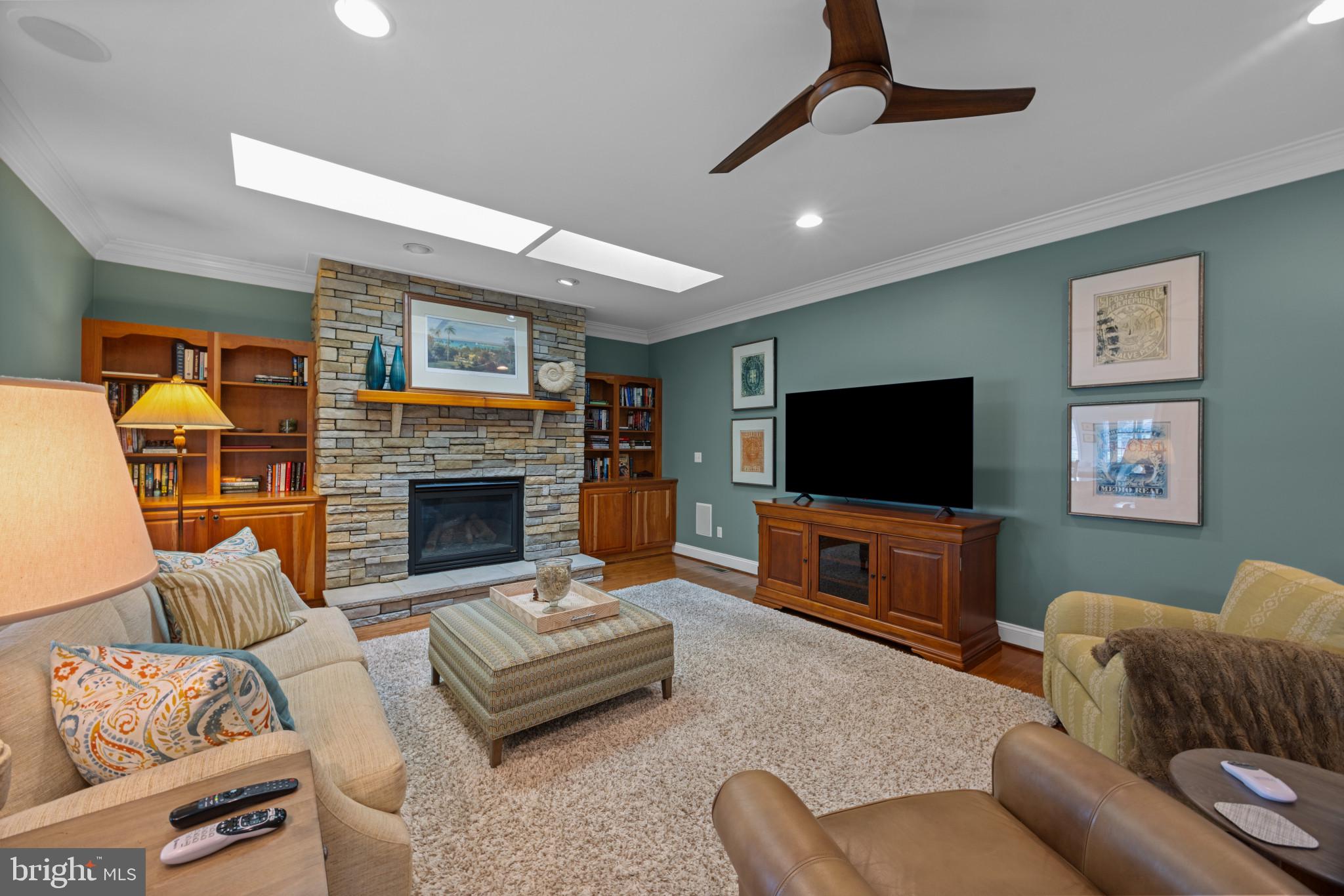 209 Beck Farm Road Centreville, MD 21617 - Photo 21 of 55 a living room with furniture and a flat screen tv