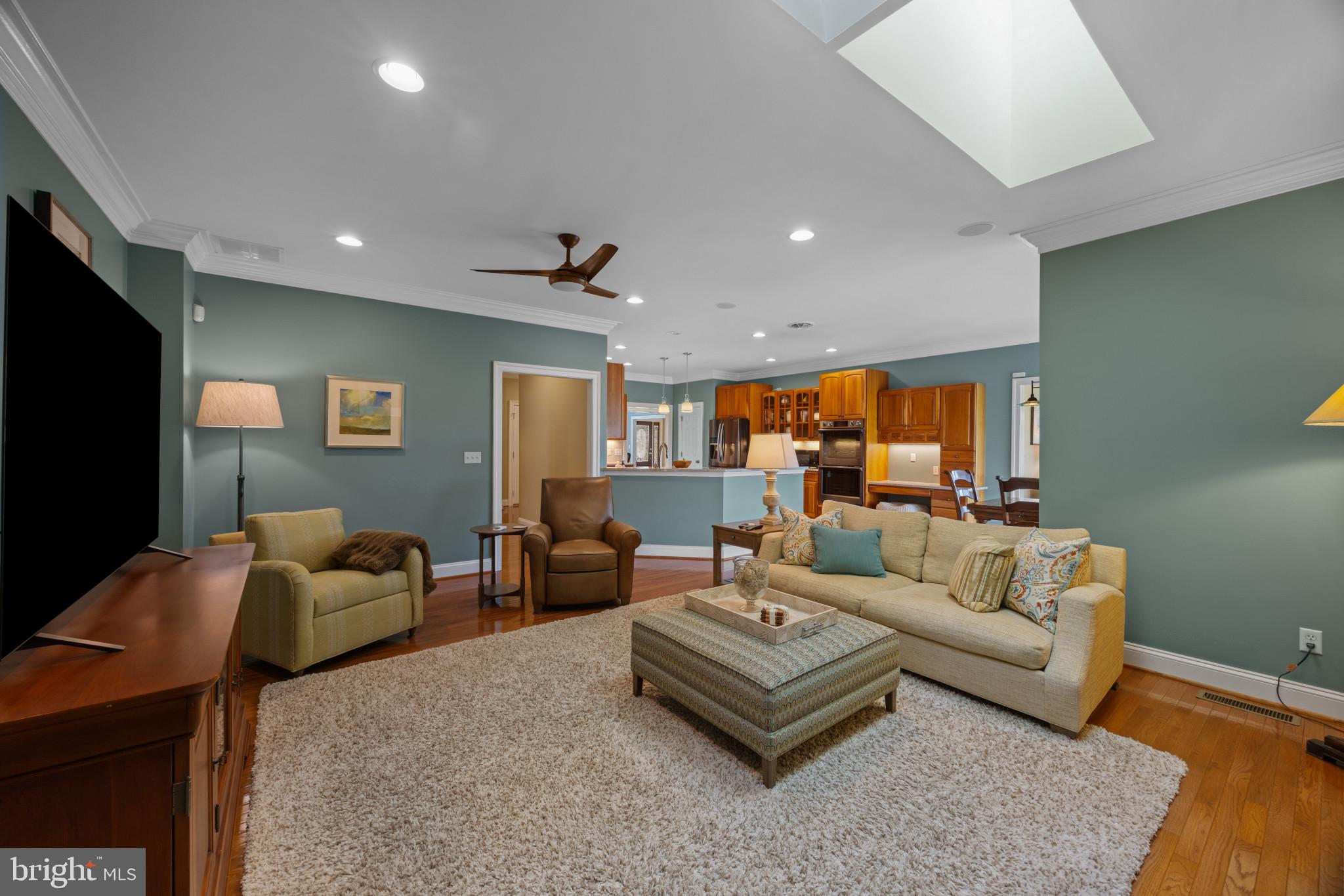 209 Beck Farm Road Centreville, MD 21617 - Photo 23 of 55 a living room with furniture and a flat screen tv