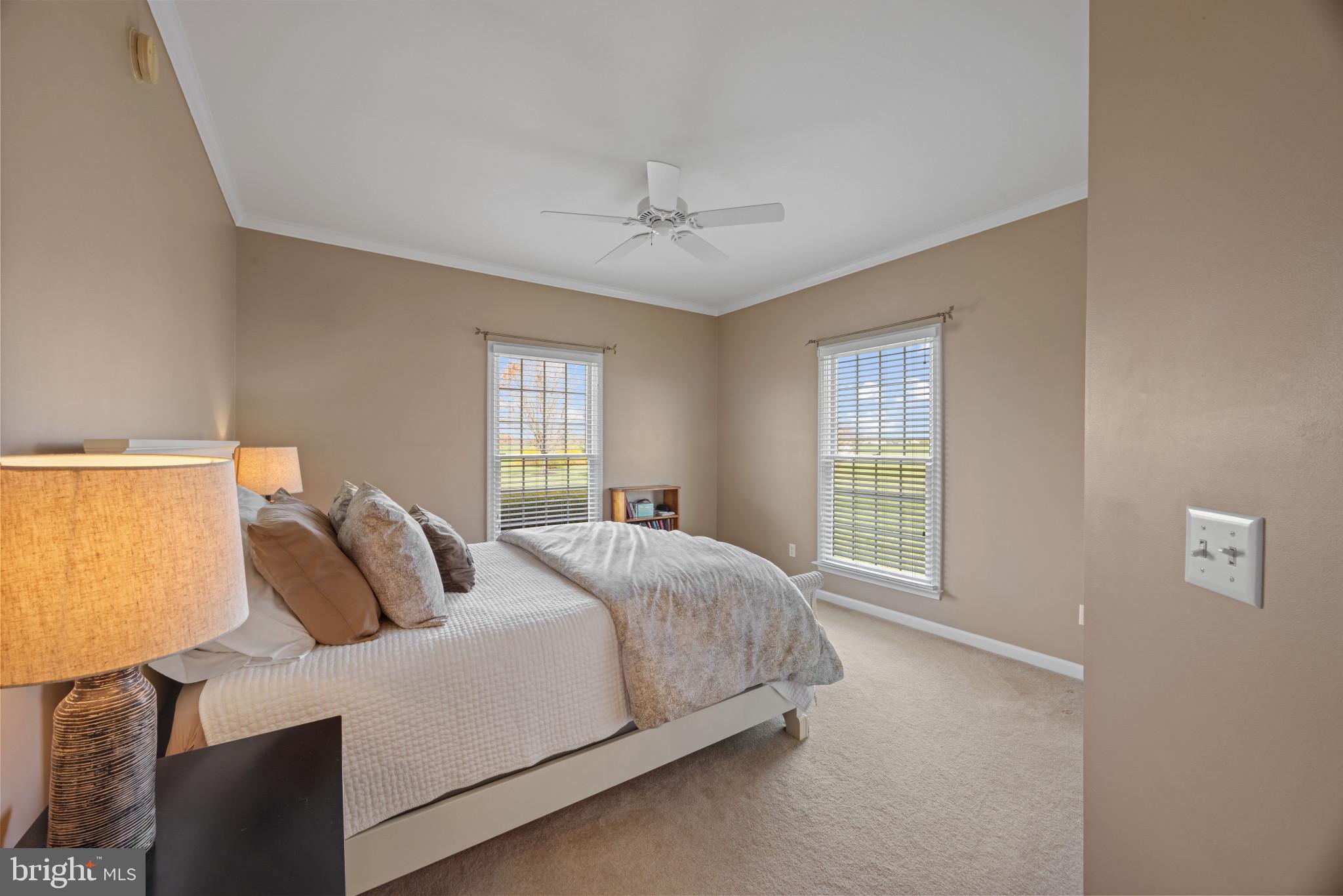 209 Beck Farm Road Centreville, MD 21617 - Photo 34 of 55 a bedroom with a bed and window