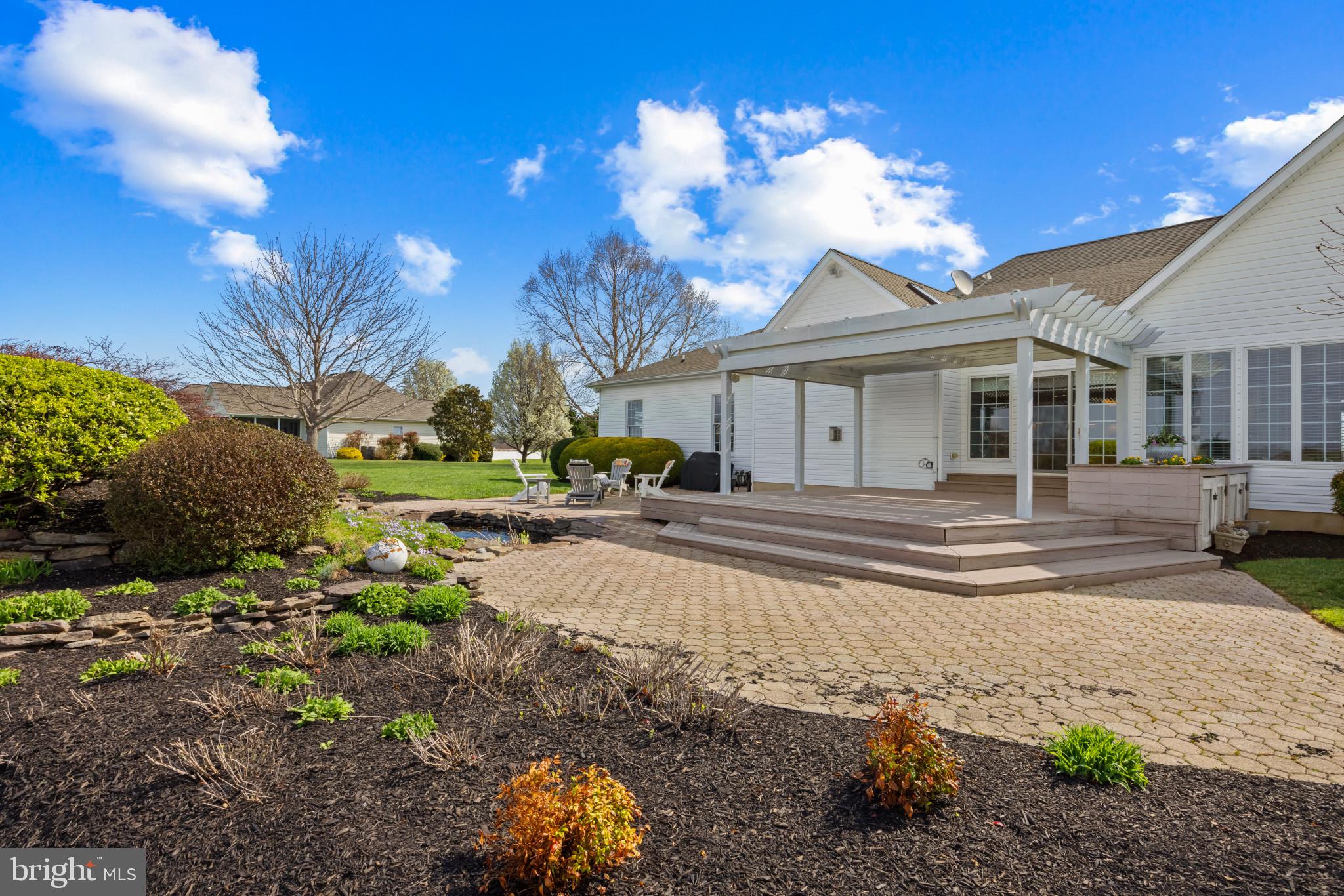 209 Beck Farm Road Centreville, MD 21617 - Photo 40 of 55 a view of a house with a yard