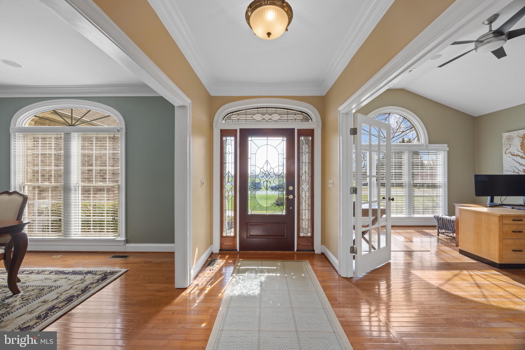209 Beck Farm Road Centreville, MD 21617 - Photo 4 of 55 a view of livingroom with furniture wooden floor and windows