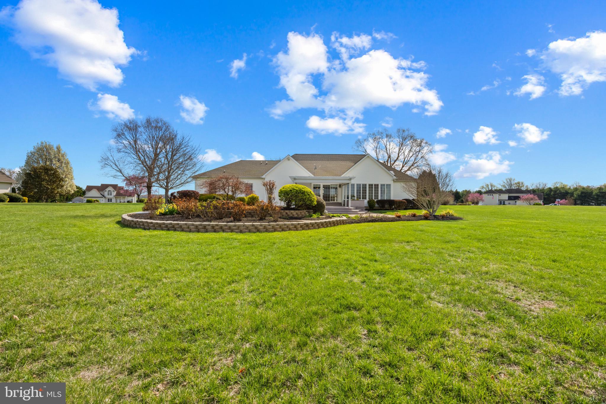 209 Beck Farm Road Centreville, MD 21617 - Photo 42 of 55 a view of a house with a big yard