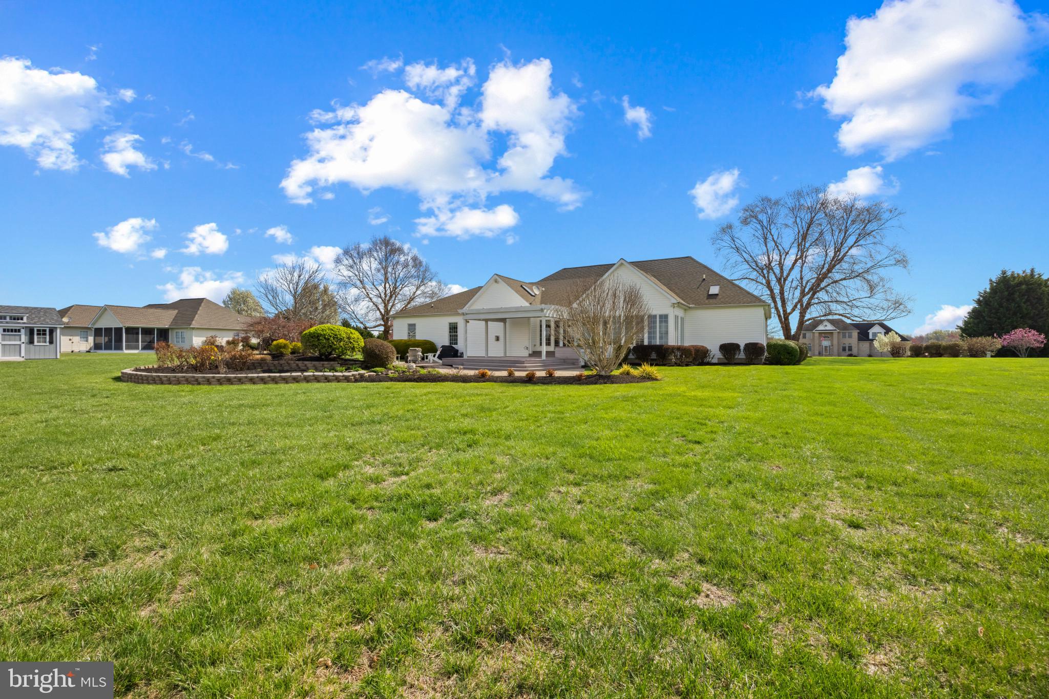 209 Beck Farm Road Centreville, MD 21617 - Photo 43 of 55 a view of yard with swimming pool and green space