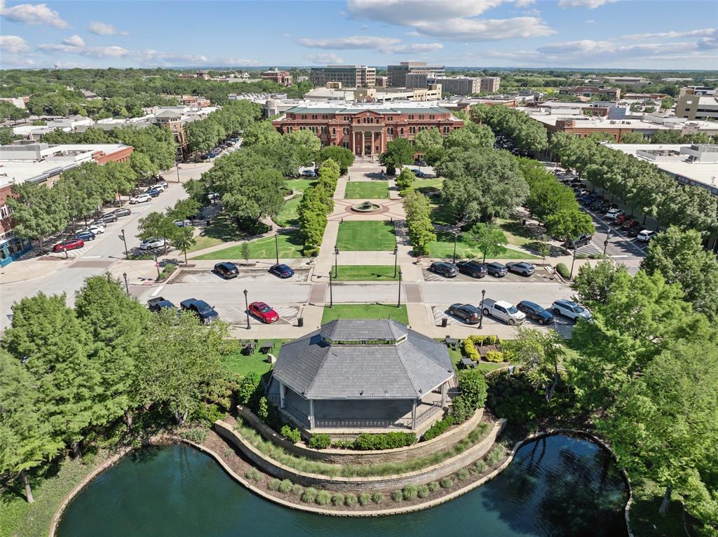 225 Park Ridge Boulevard Southlake, TX 76092 - Photo 10 of 12 a view of a swimming pool with a yard and lake view