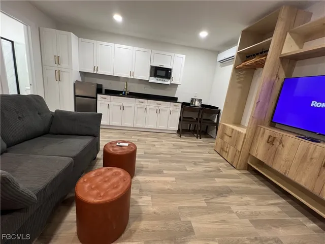 a living room with furniture and a couch
