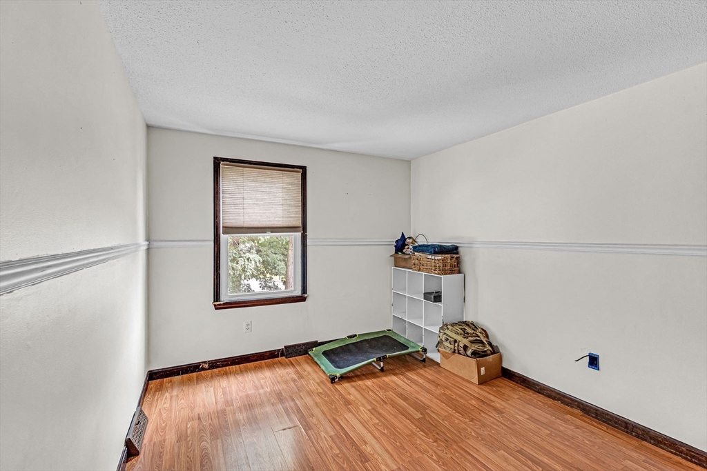 6 Baird Trace Springfield, MA 01118 - Photo 15 of 27 a view of room with hardwood floor and window