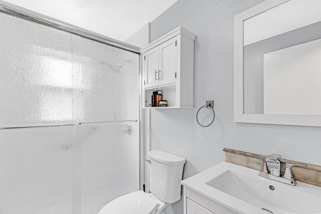 6 Baird Trace Springfield, MA 01118 - Photo 17 of 27 a bathroom with a sink toilet and shower