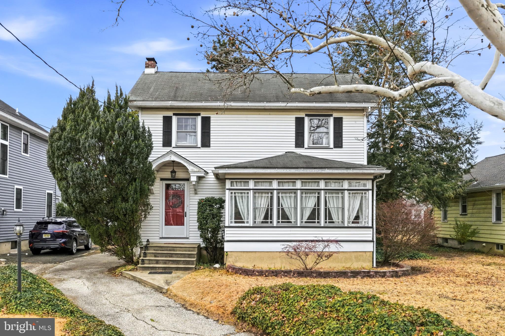 219 Harding Avenue Westmont, NJ 08108 - Photo 1 of 35 a front view of a house with a garden