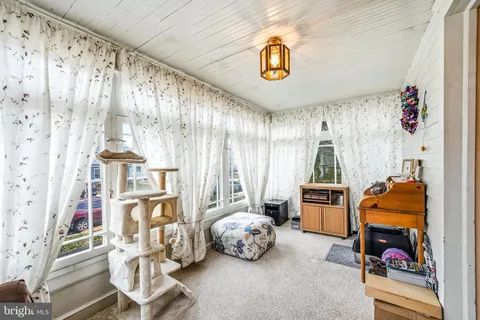 a room with furniture and a window