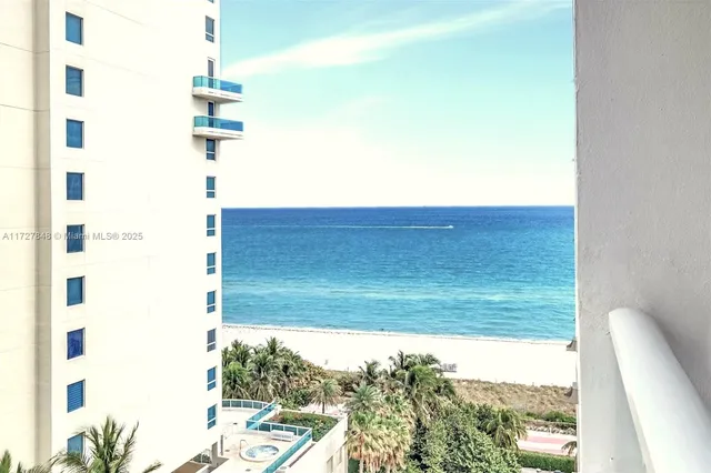 a kitchen with a sink stainless steel appliances and cabinets