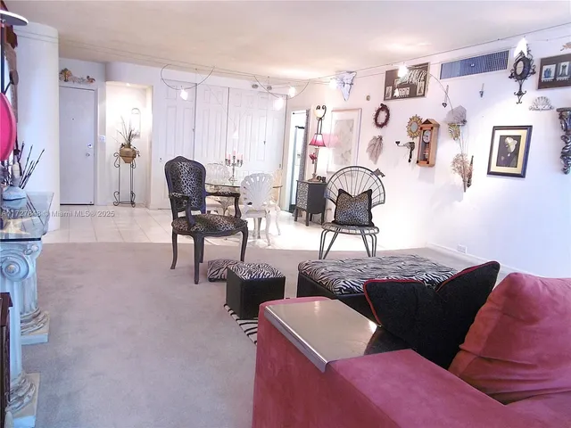 a bathroom with a sink tub and shower