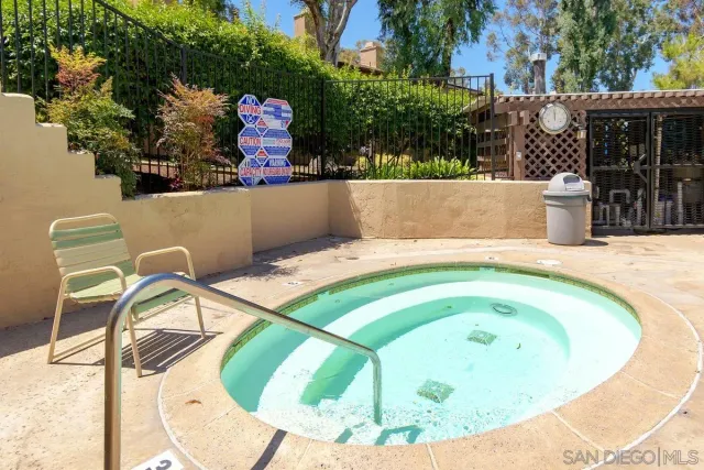 a view of outdoor space and swimming pool