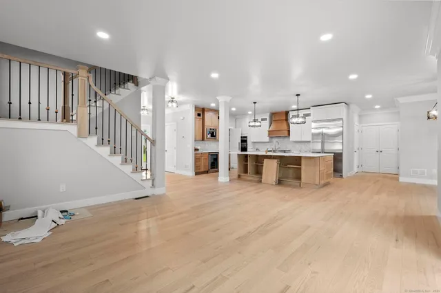 a view of a kitchen with a sink and an oven