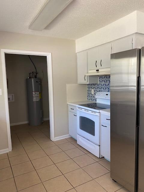 6173 Old Hickory Road Crestview, FL 32539 - Photo 8 of 22 a kitchen with stainless steel appliances granite countertop a refrigerator and a stove