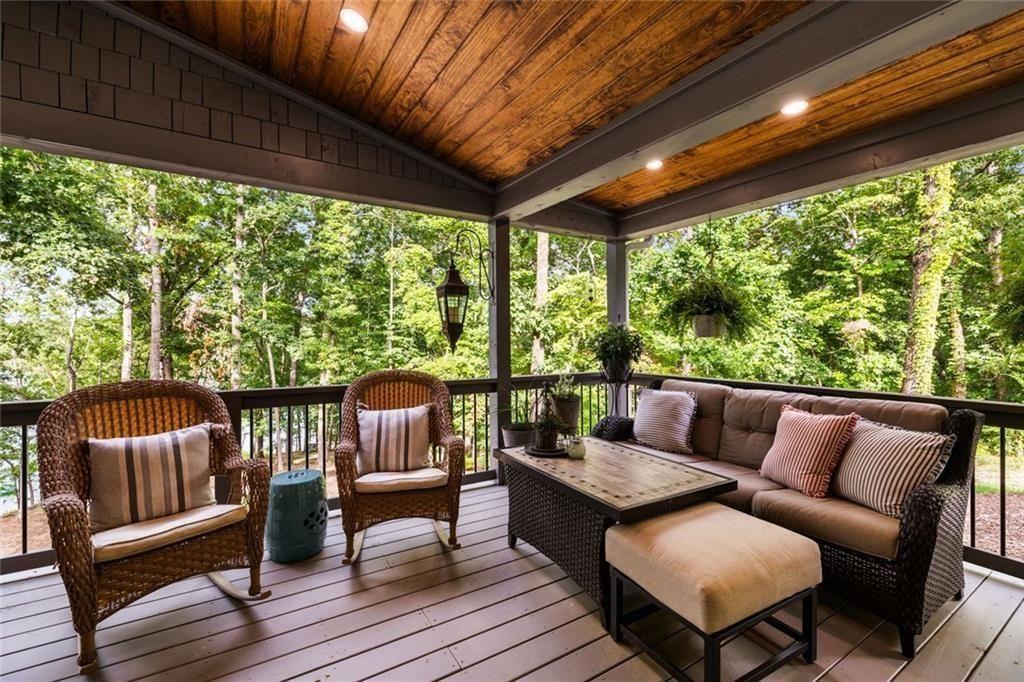 9370 Raldon Road Gainesville, GA 30506 - Photo 47 of 67 a balcony with furniture and wooden floor