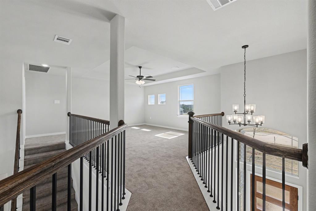 7041 Champion Road Midlothian, TX 76065 - Photo 19 of 30 a view of a hallway view with staircase