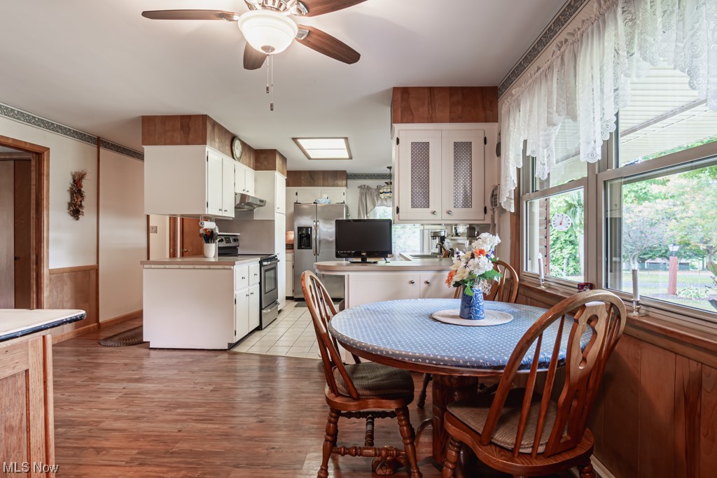 31207 Tower Road Salem, OH 44460 - Photo 12 of 34 Dining room area featuring light hardwood floors and ceiling fan