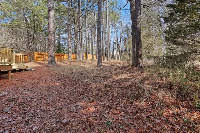 a view of a balcony with wooden floor