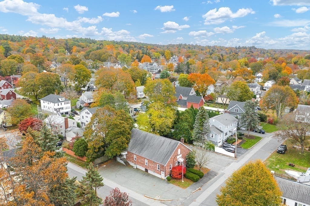18 Raymond Place Winchester, MA 01890 - Photo 11 of 16 an aerial view of residential houses with outdoor space