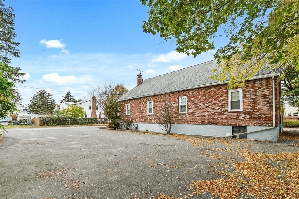 18 Raymond Place Winchester, MA 01890 - Photo 16 of 16 a view of a terrace with yard and outdoor seating