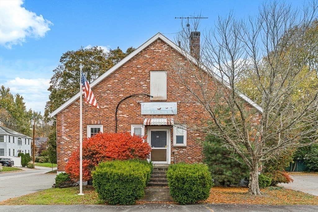 18 Raymond Place Winchester, MA 01890 - Photo 4 of 16 front view of a house with a street