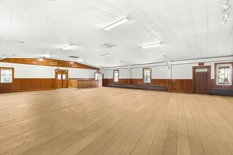 a view of a balcony with a large window