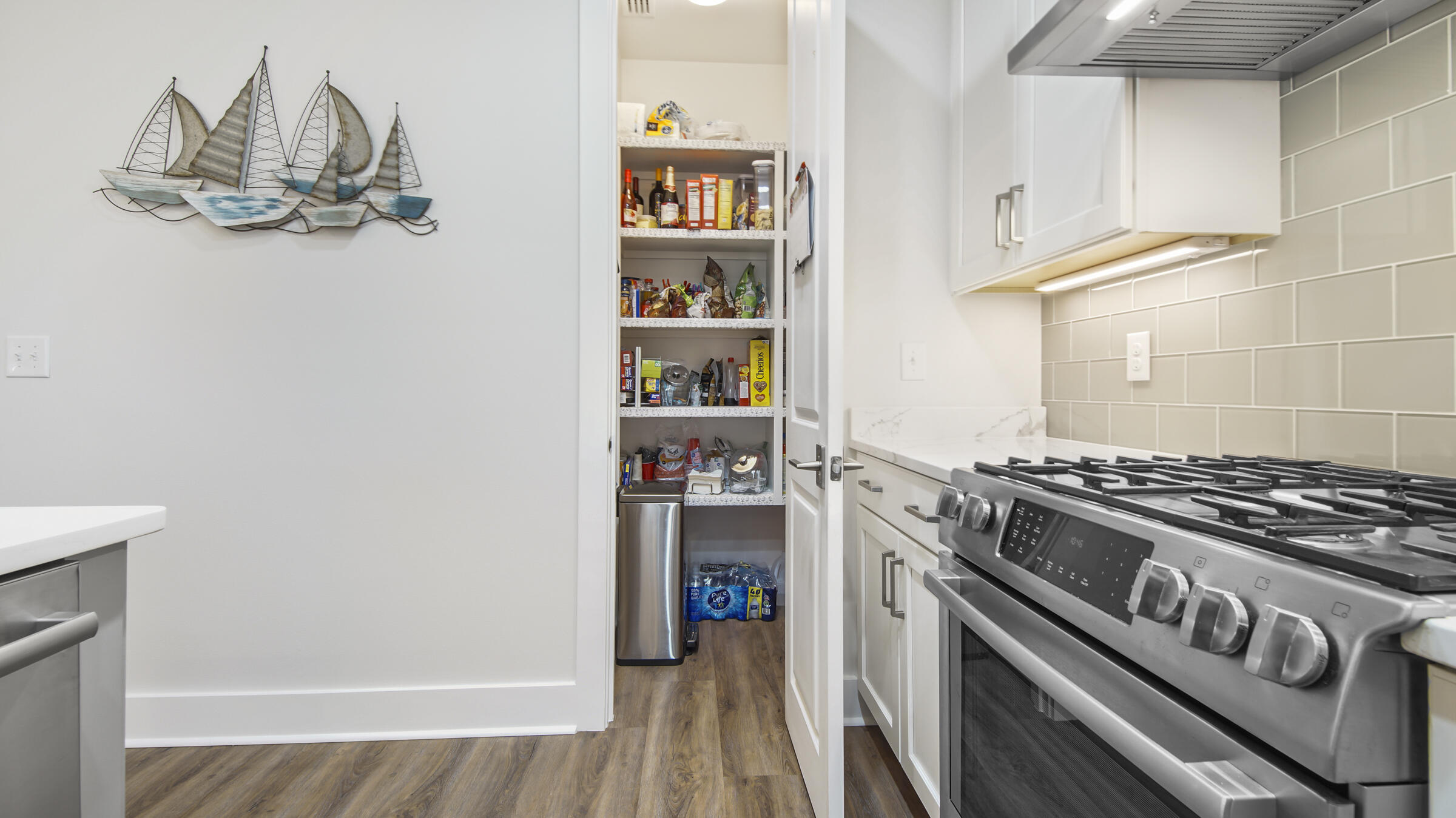 307 Sandchase Cir Inlet Beach Inlet Beach, FL 32461 - Photo 18 of 64 a kitchen with a stove and cabinets