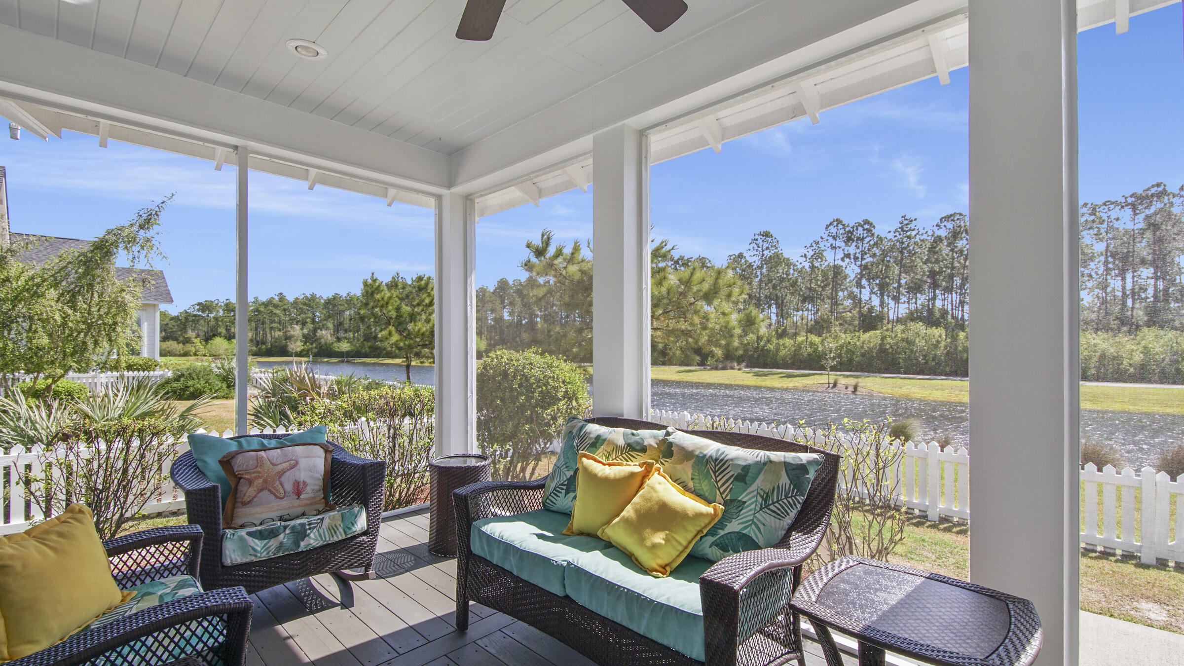 307 Sandchase Cir Inlet Beach Inlet Beach, FL 32461 - Photo 28 of 64 a living room with furniture and a floor to ceiling window