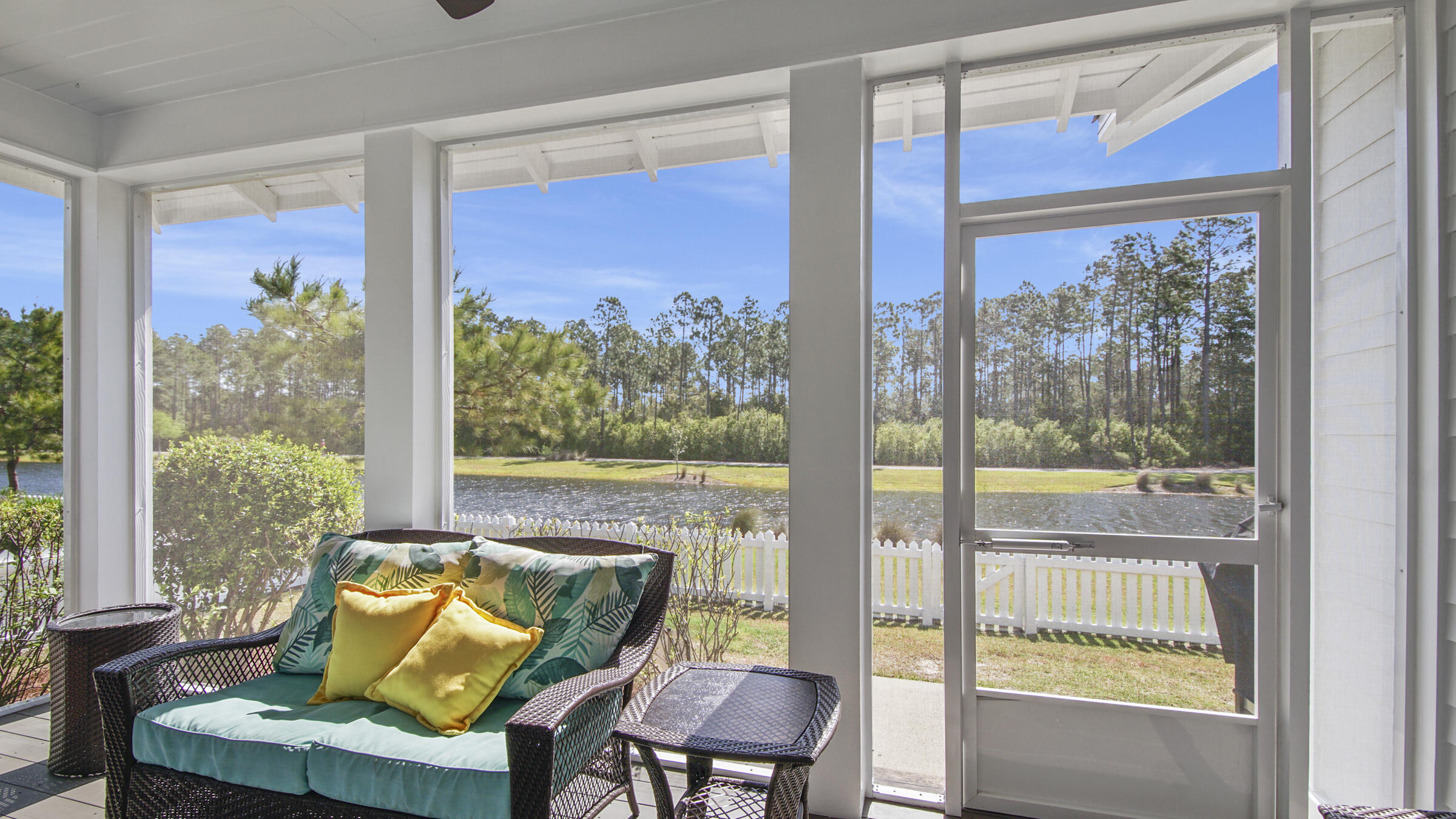307 Sandchase Cir Inlet Beach Inlet Beach, FL 32461 - Photo 29 of 64 a living room with large windows and a table