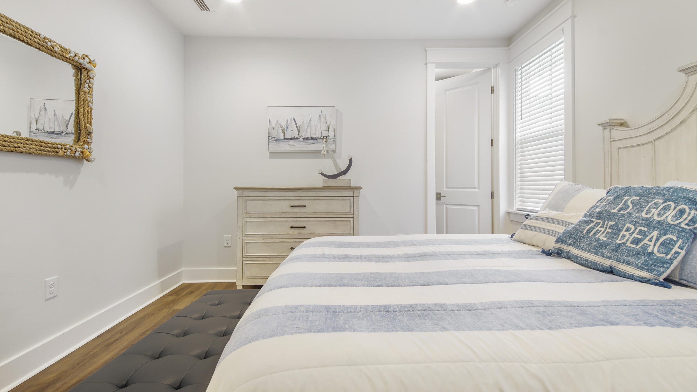 307 Sandchase Cir Inlet Beach Inlet Beach, FL 32461 - Photo 33 of 64 a bedroom with a bed and a painting on the wall