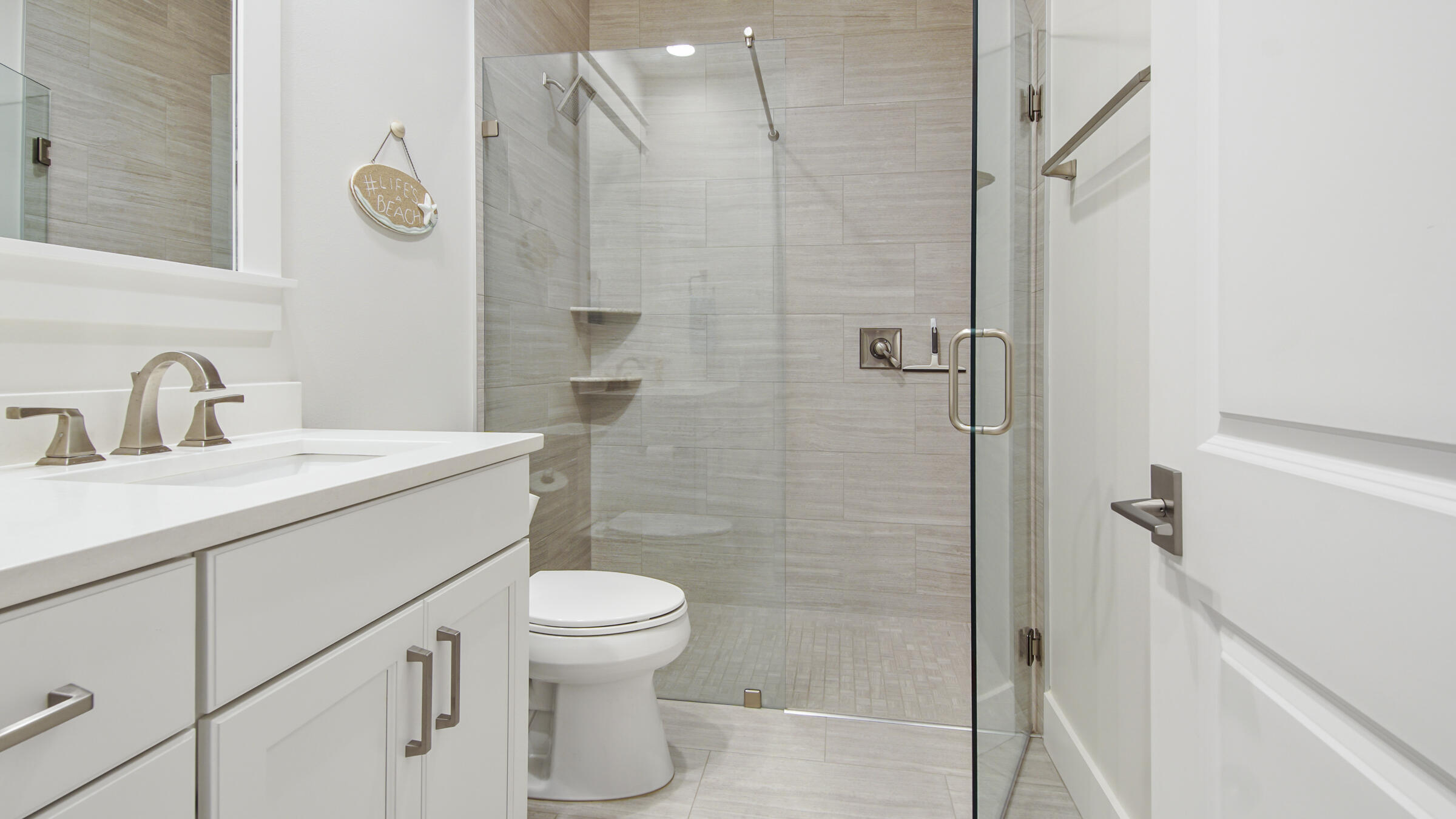307 Sandchase Cir Inlet Beach Inlet Beach, FL 32461 - Photo 34 of 64 a bathroom with a sink a toilet a mirror and shower
