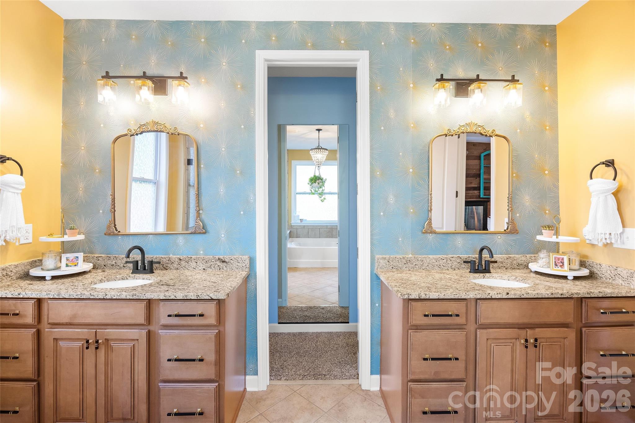 2240 Creek View Court Fort Mill, SC 29707 - Photo 20 of 40 a bathroom with a granite countertop double vanity sink and a mirror