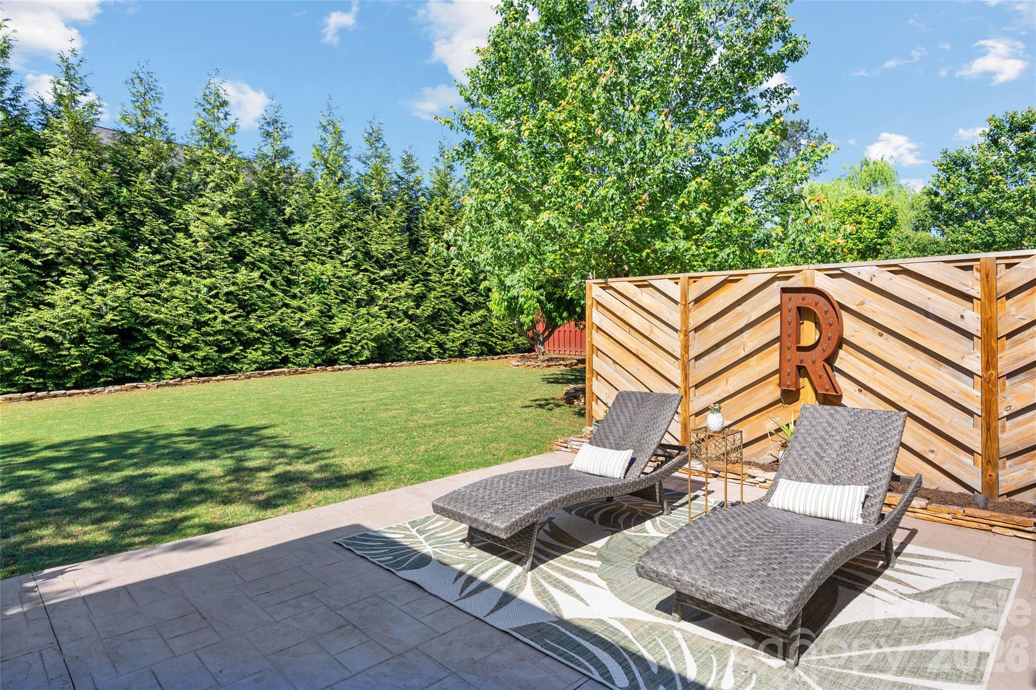 2240 Creek View Court Fort Mill, SC 29707 - Photo 30 of 40 a view of a backyard with sitting area