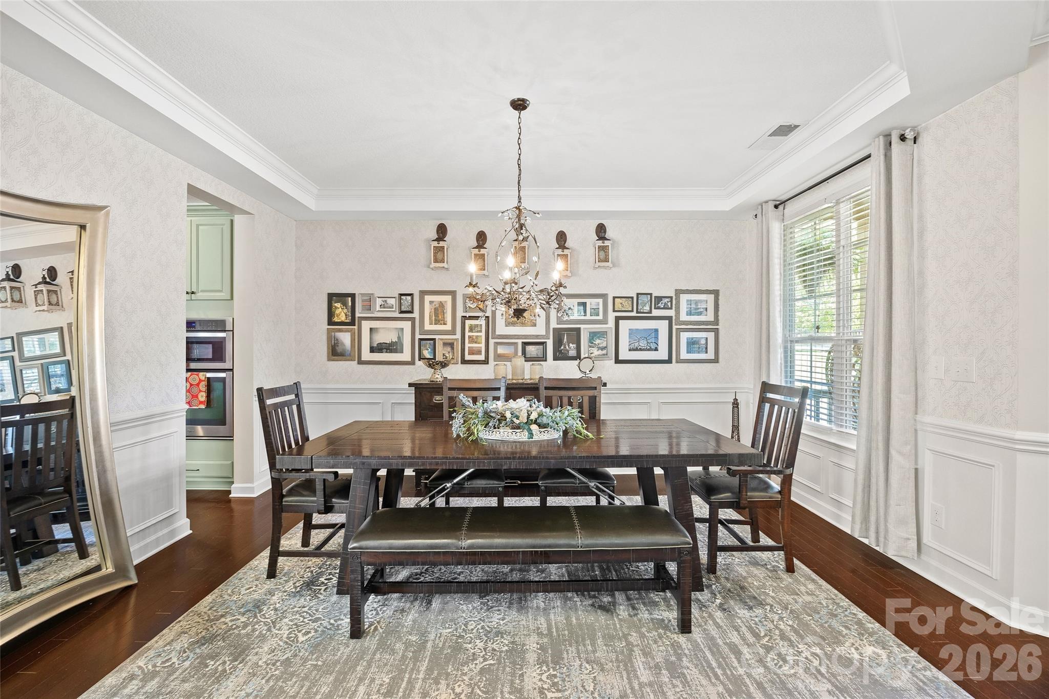 2240 Creek View Court Fort Mill, SC 29707 - Photo 6 of 40 a view of a dining room with furniture window and wooden floor