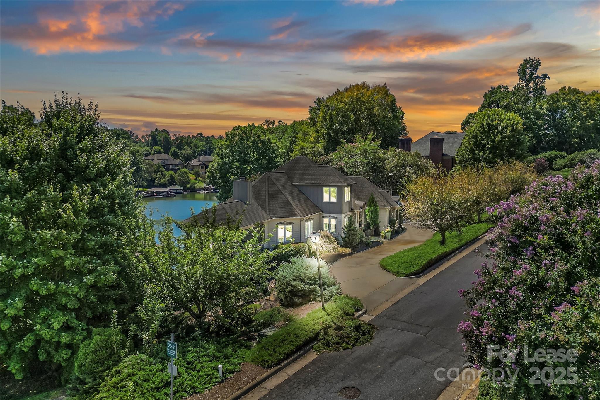 a view of a garden with a building in the background
