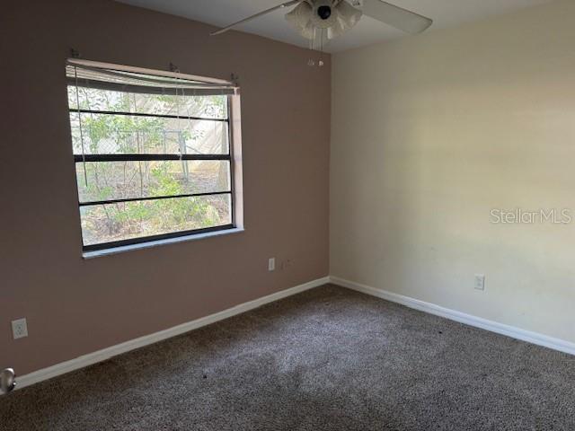 306 Cabot Street Inverness, FL 34452 - Photo 8 of 10 an empty room with a window