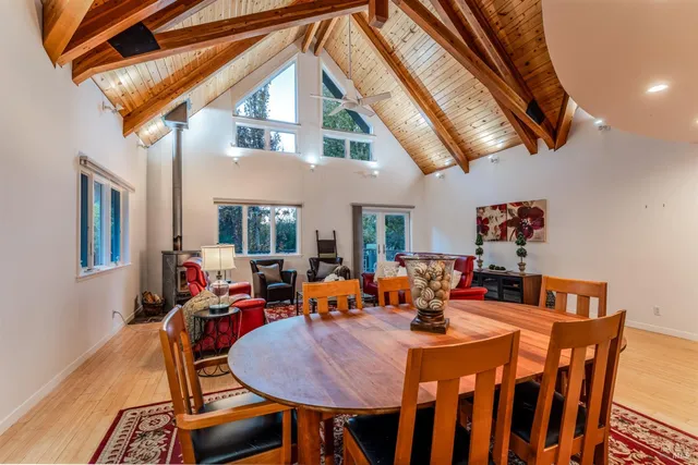 a view of a room with wooden floor and chair