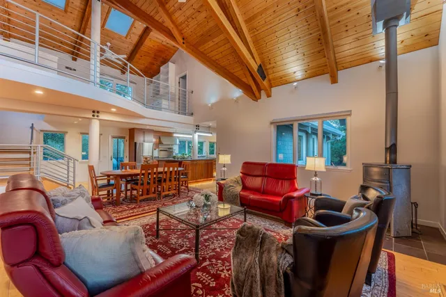 a bathroom with a granite countertop sink mirror bathtub and shower