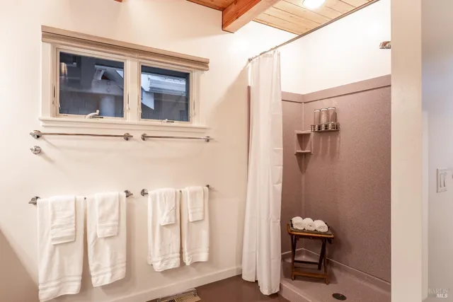 a view of a chairs and table on the deck
