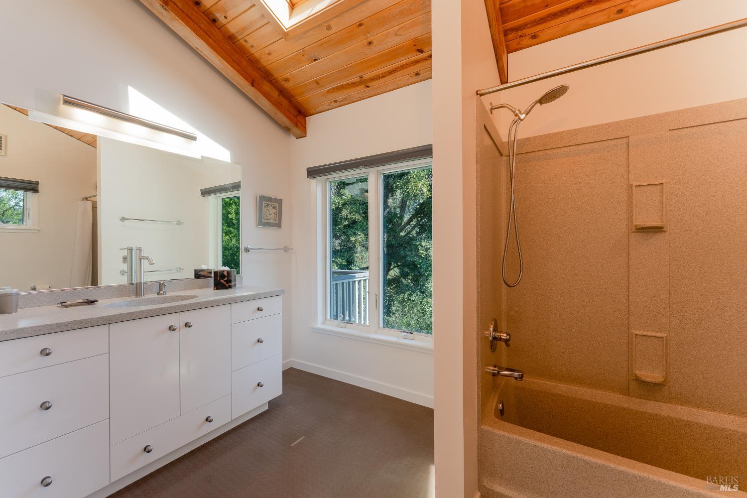 8301 West Potter Valley Road Potter Valley, CA 95469 - Photo 27 of 88 a bathroom with a granite countertop sink mirror bathtub and shower