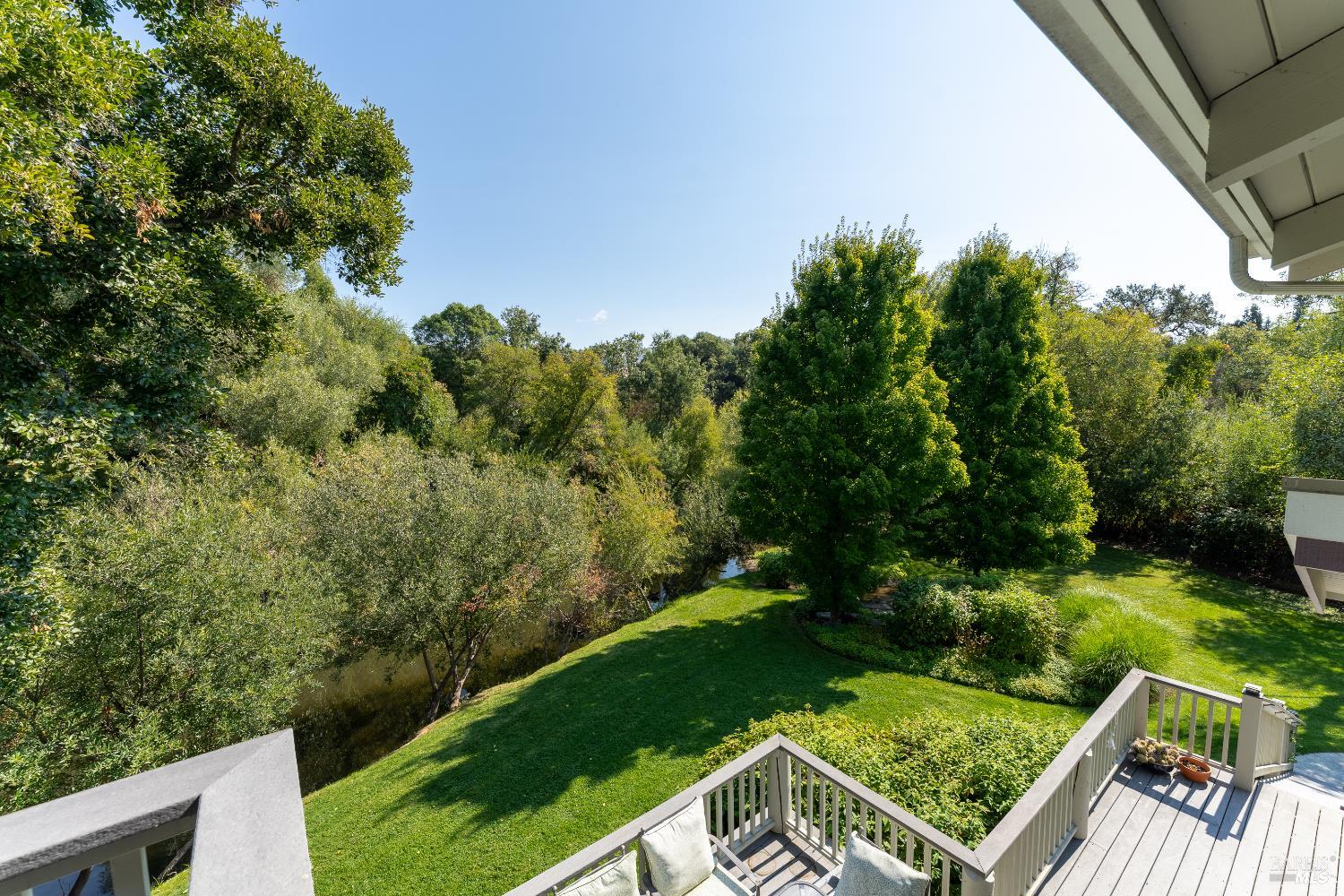8301 West Potter Valley Road Potter Valley, CA 95469 - Photo 32 of 88 a view of a backyard with plants and lake view