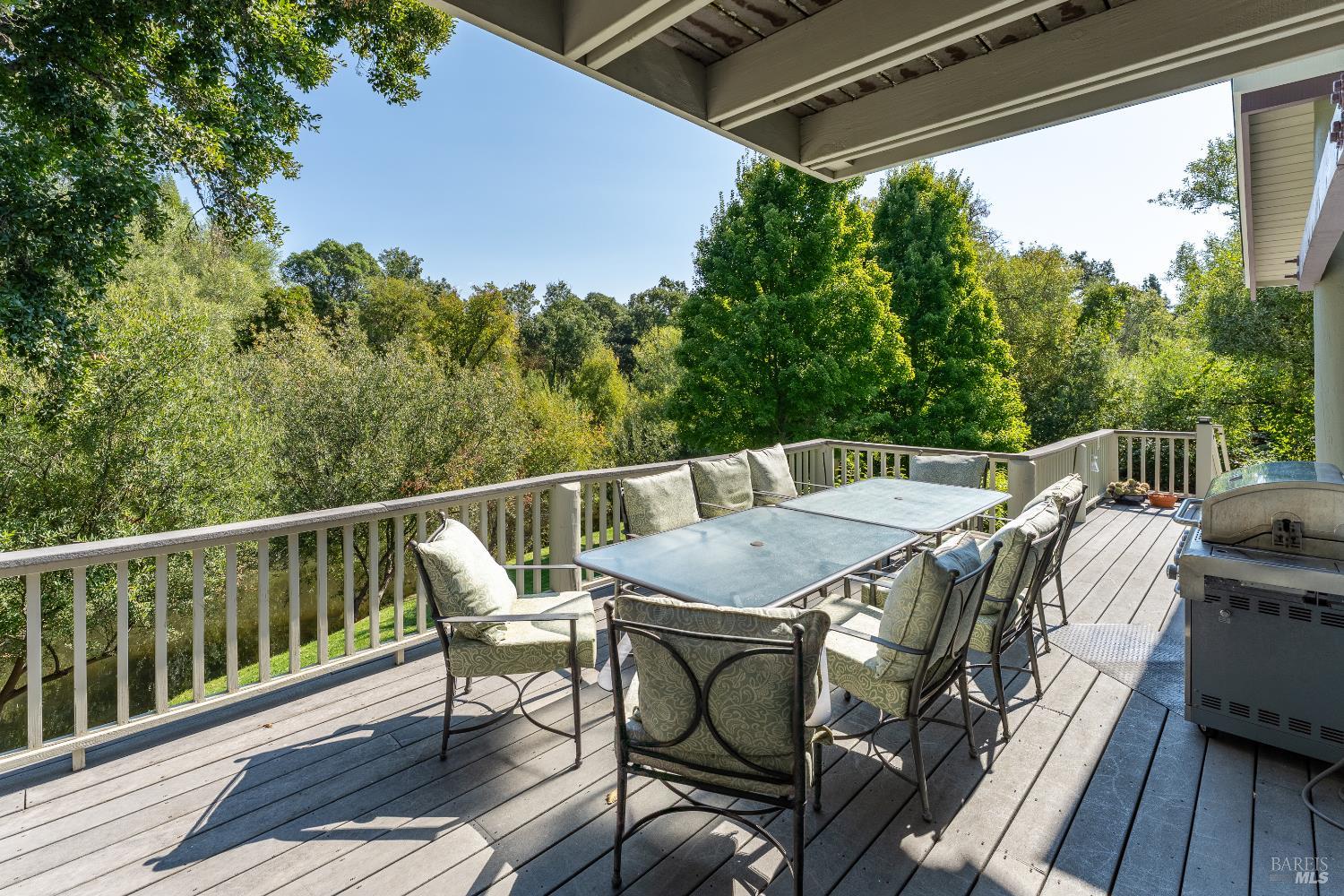 8301 West Potter Valley Road Potter Valley, CA 95469 - Photo 36 of 88 a view of a chairs and table on the deck