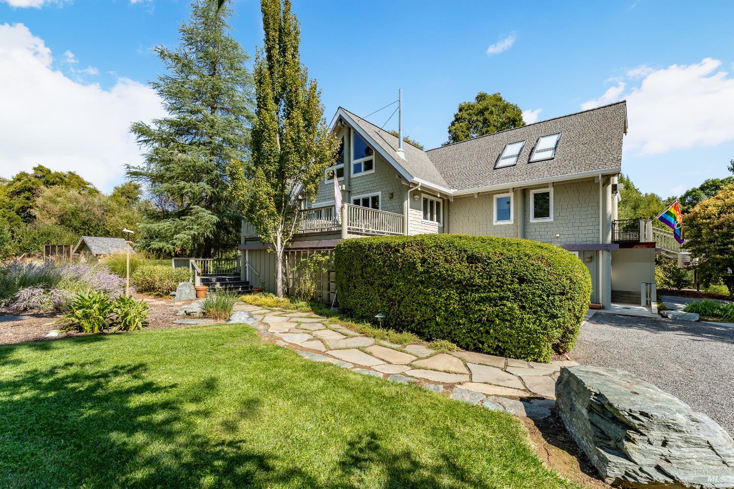 8301 West Potter Valley Road Potter Valley, CA 95469 - Photo 48 of 88 a front view of a house with a garden